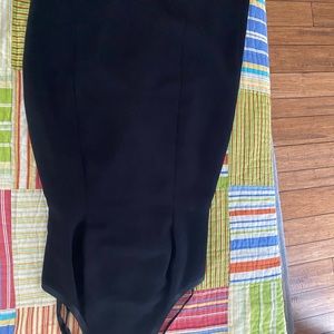 Gently used Cocktail Dress lined 100 % polyester.